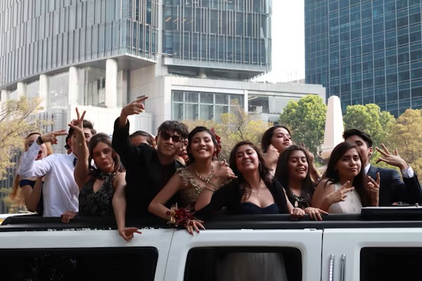 Happy customers enjoying luxury limousine service from transportlinehub.xyz during a memorable event.