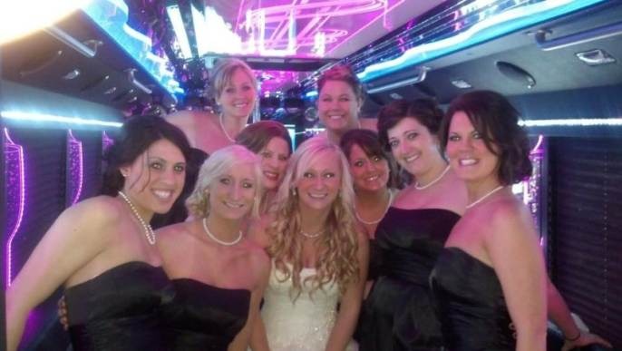 Happy customers enjoying luxury limousine service from transportlinehub.xyz in a memorable experience.