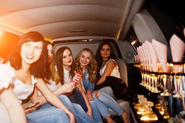 Luxury limousine service by transportlinehub.xyz showcasing satisfied customers enjoying memorable experiences.