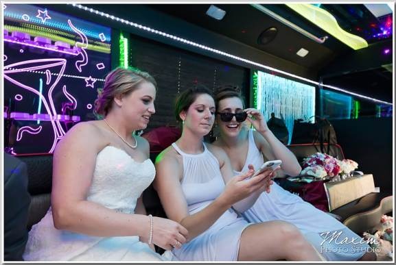 Happy customers enjoying luxury limousine service from transportlinehub.xyz during a memorable event.